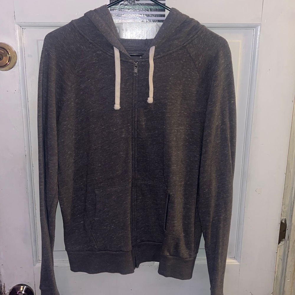 grey woman’s zip up